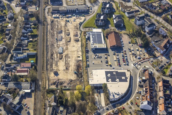 Aerial view, construction site Am Park, shopping centre with Aldi supermarket, Edeka Heder and Rossmann, Wickede, Soester Börde, North Rhine-Westphalia, Germany, construction work, construction area, building site, building plots, construction project, construction site, DE, shopping centre, shopping markets, shopping square, shopping centre, Europe, aerial view, aerial photography, aerial photography, local supply centre, new building, supermarket, overview, bird's eye view, Wickede (Ruhr), birds-eyes view, overview