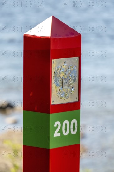 Border Norway-Russia, border posts, yellow border post Norway, red-green border post Russia, Kirkenes, Finnmark, Norway, Scandinavia, Europe, adventure travel, tourism, border markers, border stones, Hurtigruten, Hurtigruten voyage, cruise, land border, NOR, travel, travel destination, sea voyage, sightseeing, national border, tourism, Norwegian, Scandinavian, touristic