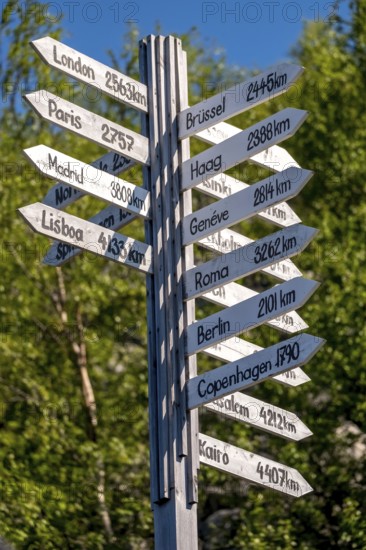 Norway-Russia border, signposts, distance to cities, Kirkenes, Finnmark, Norway, Scandinavia, Europe, adventure travel, tourism, border markers, Hurtigruten, Hurtigruten voyage, cruise, land border, NOR, travel, destination, sea voyage, sightseeing, national border, tourism, Norwegian, Scandinavian, touristic