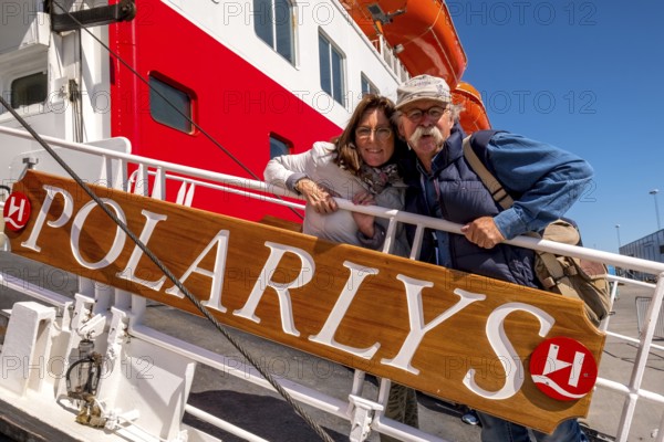 Ship MS Polarlys Tourists at the railing, Bjørnevatn, Finnmark, Norway, Scandinavia, Europe, adventure trip, Bjørnevatn, tourism, Hurtigruten, Hurtigruten trip, cruise, cruise ship, NOR, travel, destination, ship, shipping, sea voyage, sightseeing, tourism, Norwegian, Scandinavian, touristic