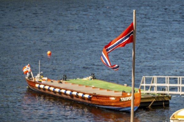 Norwegian flag, excursion boat, Kirkenes, Finnmark, Norway, Scandinavia, Europe, adventure trip, river boat, river trip, tourism, Hurtigruten, Hurtigruten trip, cruise, NOR, journey, destination, sea trip, sightseeing, tourism, Trifon, Norwegian, Scandinavian, touristic