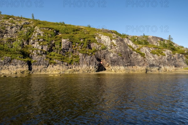 Rocky coast, cave entrance, bowøynes, Finnmark, Norway, Scandinavia, Europe, adventure trip, bowøynes, rock faces, tourism, Hurtigruten, Hurtigruten trip, cruise, coast, NOR, trip, destination, sign, sea trip, sightseeing, tourism, Norwegian, Scandinavian, touristic
