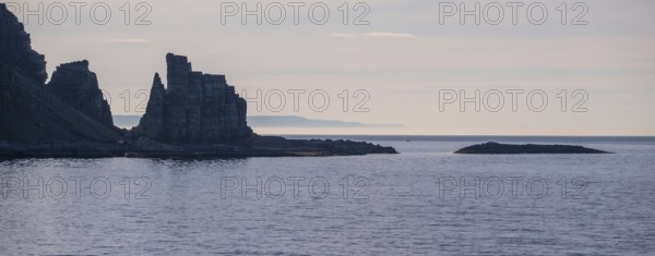 Finnkjerka rock formation, Kjøllefjord, Finnmark, Norway, Scandinavia, Europe, adventure trip, Finnkirka, fjord, tourism, backlight, Hurtigruten, Hurtigruten trip, Church of the Finns, Kjøllefjord, cliff, cruise, legends, NOR, natural monument, Sami sacrificial site, journey, destination, sea trip, sightseeing, tourism, Norwegian, Scandinavian, touristic