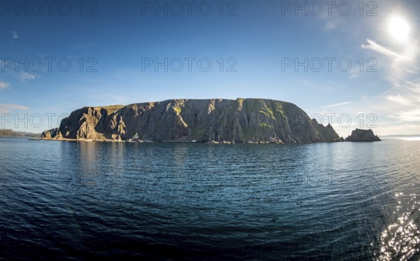 Finnkjerka rock formation, Kjøllefjord, Finnmark, Norway, Scandinavia, Europe, adventure trip, Finnkirka, fjord, tourism, Hurtigruten, Hurtigruten trip, Church of the Finns, Kjøllefjord, cliff, cruise, legends, NOR, natural monument, Sami sacrificial site, journey, destination, sea trip, sightseeing, tourism, Norwegian, Scandinavian, touristic