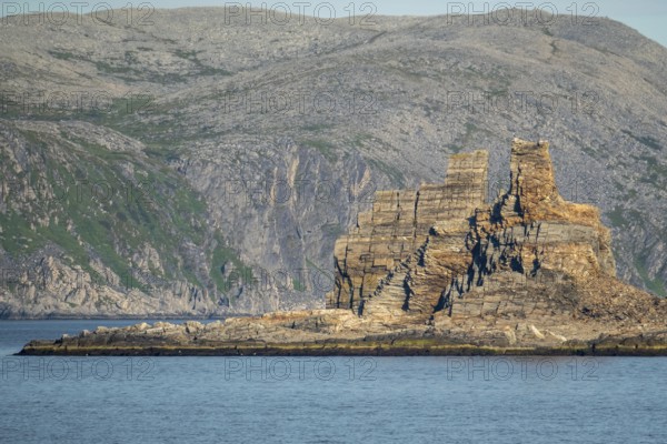 Finnkjerka rock formation, Kjøllefjord, Finnmark, Norway, Scandinavia, Europe, adventure trip, Finnkirka, fjord, tourism, Hurtigruten, Hurtigruten trip, Church of the Finns, Kjøllefjord, cliff, cruise, legends, NOR, natural monument, Sami sacrificial site, journey, destination, sea trip, sightseeing, tourism, Norwegian, Scandinavian, touristic