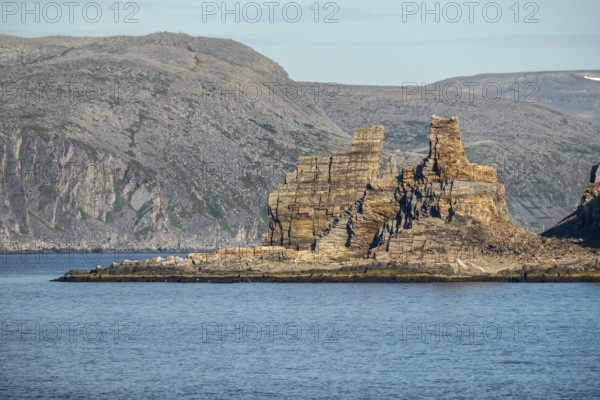 Finnkjerka rock formation, Kjøllefjord, Finnmark, Norway, Scandinavia, Europe, adventure trip, Finnkirka, fjord, tourism, Hurtigruten, Hurtigruten trip, Church of the Finns, Kjøllefjord, cliff, cruise, legends, NOR, natural monument, Sami sacrificial site, journey, destination, sea trip, sightseeing, tourism, Norwegian, Scandinavian, touristic