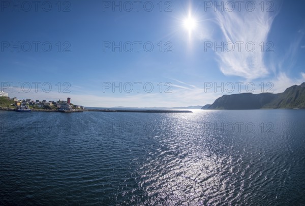 Harbour entrance and lighthouse, Honningsvåg, Finnmark, Norway, Scandinavia, Europe, adventure travel, tourism, backlight, harbour, Honningsvåg, Hurtigruten, Hurtigruten voyage, cruise, sea, NOR, travel, destination, sea voyage, sightseeing, tourism, blue sky, Norwegian, Scandinavian, touristic