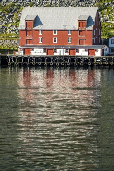 Foldalbruket kystkultursenter, museum, Norwegian house in red colours, jetty, Kjøllefjord, Finnmark, Norway, Scandinavia, Europe, adventure travel, fjord, Foldalbruket Coastal Cultural Centre, tourism, wooden house, Hurtigruten, Hurtigruten journey, Kjøllefjord, cruise, NOR, journey, destination, sea voyage, sightseeing, tourism, Norwegian, red facade, Scandinavian, tourist, white windows