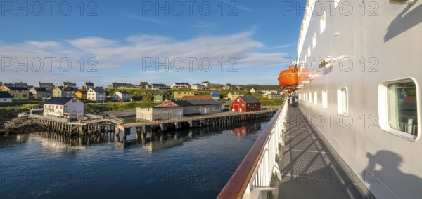 Ship railing and town view, Mehamn, Finnmark, Norway, Scandinavia, Europe, adventure travel, tourism, Hurtigruten, Hurtigruten voyage, cruise, cruise ship, NOR, panorama, journey, destination, railing, ship, ship MS Polarlys, shipping, sea voyage, sightseeing, tourism, Norwegian, Scandinavian, touristic
