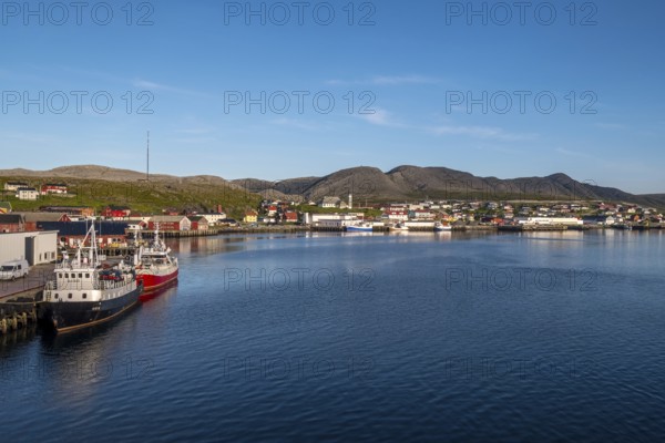 Town view and harbour, Mehamn Church, Mehamn, Finnmark, Norway, Scandinavia, Europe, adventure travel, place of worship, mountainside, tourism, religious community, place of worship, property tax, sacred site, Hurtigruten, Hurtigruten voyage, real estate, church, congregation, denomination, cruise, NOR, travel, destination, religion, religious site, ships, sea voyage, sightseeing, tourism, residential complex, living and life, residential area, residential buildings, quality of life, residential neighbourhood, housing estate, Norwegian, Scandinavian, touristic