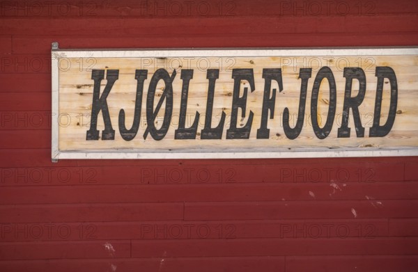 Place name sign, Kjøllefjord, Finnmark, Norway, Scandinavia, Europe, adventure travel, fjord, tourism, Hurtigruten, Hurtigruten voyage, Kjøllefjord, cruise, NOR, travel, destination, sign, sea voyage, sightseeing, tourism, Norwegian, Scandinavian, touristic