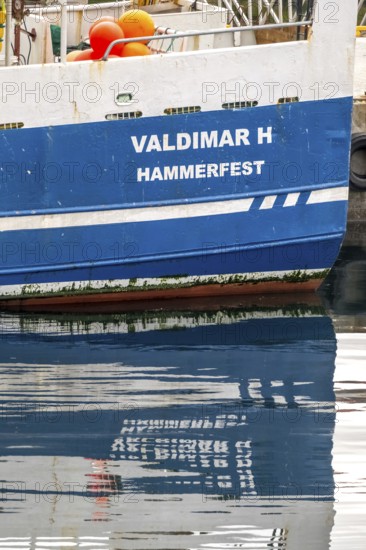 Ship bow with reflection, Honningsvåg, Finnmark, Norway, Scandinavia, Europe, adventure travel, tourism, Honningsvåg, Hurtigruten, Hurtigruten voyage, cruise, NOR, journey, destination, ship, sea voyage, sightseeing, tourism, Valdimar H Hammerfest ship name, Norwegian, Scandinavian, touristic