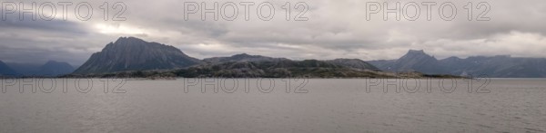 Panoramic photo, coast, Rødøy, Nordland, Norway, Scandinavia, Europe, adventure travel, tourism, mountain, mountain range, Hurtigruten, Hurtigruten voyage, cruise, coastal landscape, coastal strip, NOR, travel, destination, Rødøy, sea voyage, sightseeing, tourism, Norwegian, Scandinavian, touristic