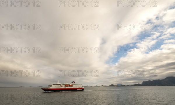 Ship MS Kong Harald, Bolga, Nordland, Norway, Scandinavia, Europe, adventure travel, tourism, Hurtigruten, Hurtigruten tour, cruise, cruise ship, coast, coastal landscape, coastal region, coastal strip, liner service, NOR, passenger ship, shipping company Hurtigruten AS, journey, destination, ship, sea voyage, sightseeing, tourism, clouds, Norwegian, Scandinavian, touristic