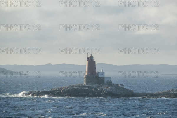 Lighthouse Grinna, Vikna, North Trondelag, Uthaug, Trøndelag, Norway, Scandinavia, Europe, Abelvær, adventure trip, fjord, tourism, Fryr, Hurtigruten, Hurtigruten trip, island, cruise, coast, coastal landscape, lighthouse, NOR, travel, destination, archipelago, sea voyage, seabird sanctuary, sightseeing, tourism, Trøndelag, tower, Norwegian, red colour, red facade, Scandinavian, touristic
