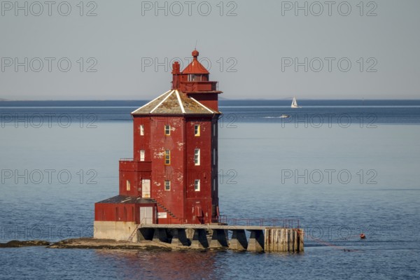 Kjeungskjær Fyr, red lighthouse, off the Norwegian coast on a small archipelago off Ã˜rland, Trø¸ndelag.Uthaug, Trø¸ndelag, Norway, Scandinavia, Europe, adventure travel, monument protection, fjord, tourism, Hurtigruten, Hurtigruten voyage, island, cruise, coast, coastal landscape, lighthouse, NOR, travel, destination, skerry, sea voyage, seabird sanctuary, sailing boat, sightseeing, tourism, Trøndelag, tower, Uthaug, octagonal, Norwegian, red colour, red facade, Scandinavian, tourist, Lroter Leutturm, wooden lighthouse, historic lighthouse, landmark, landmarking