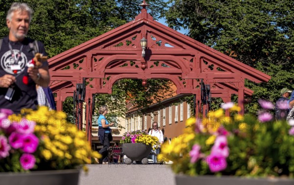 Gamle Bybro, historic bridge with red portals, Trondheim, Trøndelag, Norway, Scandinavia, Europe, adventure trip, old town bridge, bridge, river Nidelva, tourism, Gamle Bybrua, Hurtigruten, Hurtigruten trip, cruise, NOR, trip, destination, sea trip, sight, sightseeing, city bridge, tourism, Trøndelag, historic, Norwegian, Scandinavian, touristic