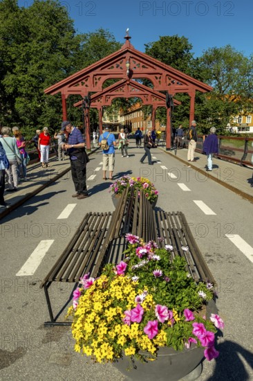 Gamle Bybro, historic bridge with red portals, Trondheim, Trøndelag, Norway, Scandinavia, Europe, adventure trip, old town bridge, bridge, river Nidelva, tourism, Gamle Bybrua, Hurtigruten, Hurtigruten trip, cruise, NOR, trip, destination, sea trip, sight, sightseeing, city bridge, tourism, Trøndelag, historic, Norwegian, Scandinavian, touristic