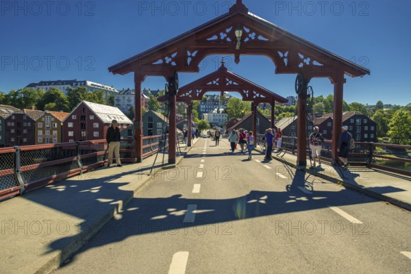 Gamle Bybro, historic bridge with red portals, Trondheim, Trøndelag, Norway, Scandinavia, Europe, adventure trip, old town bridge, bridge, river Nidelva, tourism, Gamle Bybrua, Hurtigruten, Hurtigruten trip, cruise, NOR, trip, destination, sea trip, sight, sightseeing, city bridge, tourism, Trøndelag, historic, Norwegian, Scandinavian, touristic