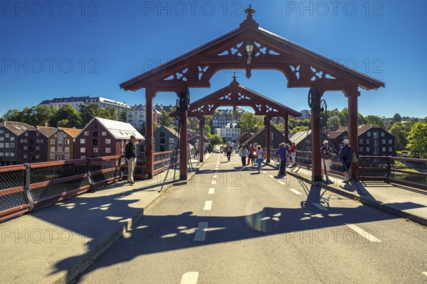 Gamle Bybro, historic bridge with red portals, Trondheim, Trøndelag, Norway, Scandinavia, Europe, adventure trip, old town bridge, bridge, river Nidelva, tourism, Gamle Bybrua, Hurtigruten, Hurtigruten trip, cruise, NOR, trip, destination, sea trip, sight, sightseeing, city bridge, tourism, Trøndelag, historic, Norwegian, Scandinavian, touristic