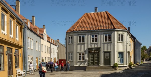 Residential buildings in the city centre, Nedre Bakklandet corner Nygata Street, Trondheim, Trøndelag, Norway, Scandinavia, Europe, adventure travel, tourism, Hurtigruten, Hurtigruten voyage, cruise, NOR, travel, destination, sea voyage, sightseeing, tourism, Trøndelag, historic street, historic residential buildings, Norwegian, Scandinavian, touristic