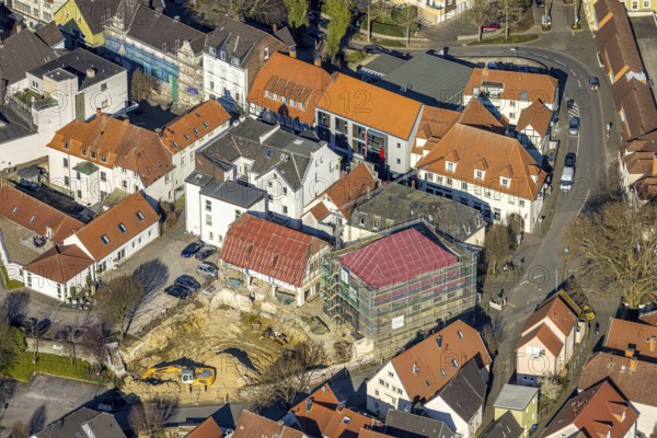 Aerial view, construction site with new building on the corner of Kämperstraße and Steinerstraße, former Fredrich and Neuschäfer furniture store, Werl, Werl-Unnaer Börde, North Rhine-Westphalia, Germany, worker, architecture, exterior view, construction work, construction worker, construction area, construction site, building plot, construction crane, construction measure, construction project, construction site, DE, development, Europe, progress, building, scaffolding, trade, commercial enterprises, commercial area, commercial area, commercial property, commercial park, commercial site, commercial use, real estate, industrial area, industrial site, infrastructure, construction, intersection, Kämperstraße, aerial view, aerial photography, aerial photography, machines, modernisation, new construction, planning, renovation, city, urban development, Steinerstraße, street, daylight, overview, urban, traffic, bird's-eye view, tools, birds-eyes view, overview