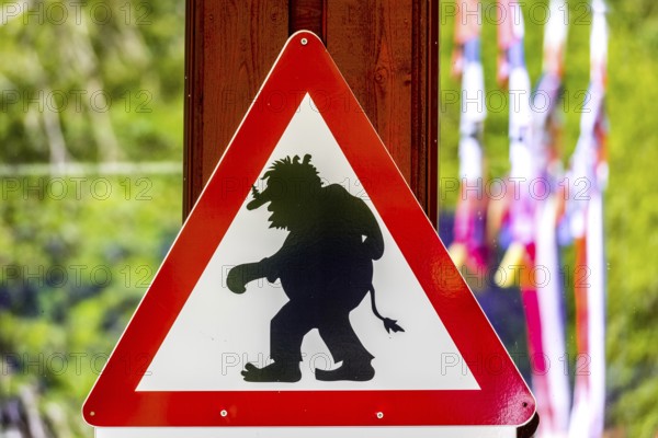 Traffic sign, caution trolls, Innfjorden, Møre og Romsdal, Norway, Scandinavia, Europe, adventure travel, mountain spirit, mythical creature, flags, tourism, danger, Hurtigruten, Hurtigruten voyage, cruise, mythology, Møre og Romsdal, NOR, travel, destination, sign, sea voyage, sightseeing, tourism, troll, caution, forest spirit, warning, Norwegian, Scandinavian, touristic