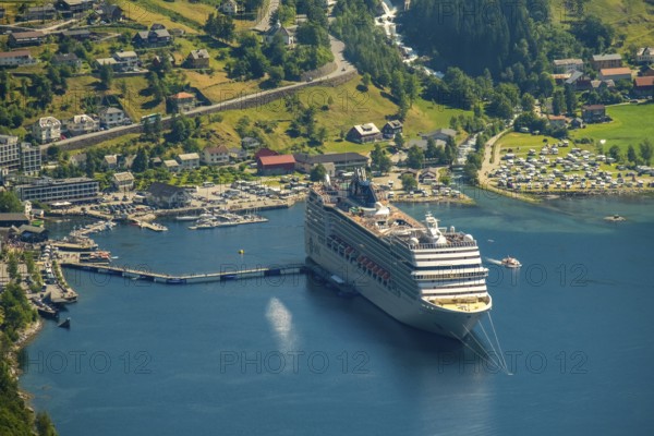 GeirangerFjord, view of Geiranger, ship MSC Orchestra at anchor, Møre og Romsdal, Norway, Scandinavia, Europe, adventure cruise, mooring, boats, tourism, Geiranger, harbour, Hurtigruten, Hurtigruten cruise, cruise, cruise ship, motorboats, Møre og Romsdal, NOR, travel, destination, ship, sea voyage, sightseeing, tourism, UNESCO World Heritage Site, motorhomes, motorhome site, yachts, Norwegian, Scandinavian, tourism