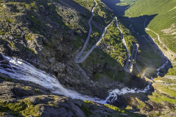 Trollstigen near Andalsnes, serpentines, hairpin bends, Stigfossen waterfall, Innfjorden, Møre og Romsdal, Norway, Scandinavia, Europe, adventure trip, mountain road R63, tourism, Hurtigruten, Hurtigruten trip, cruise, Møre og Romsdal, NOR, travel, destination, sea trip, sightseeing, tourism, waterfall, Norwegian, Scandinavian, touristic