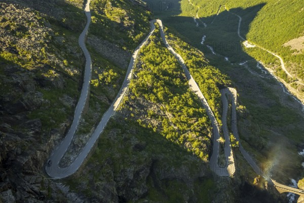 Trollstigen near Andalsnes, serpentines, hairpin bends, Stigfossen waterfall, Innfjorden, Møre og Romsdal, Norway, Scandinavia, Europe, adventure trip, mountain road R63, tourism, Hurtigruten, Hurtigruten trip, cruise, Møre og Romsdal, NOR, travel, destination, sea trip, sightseeing, tourism, waterfall, Norwegian, Scandinavian, touristic