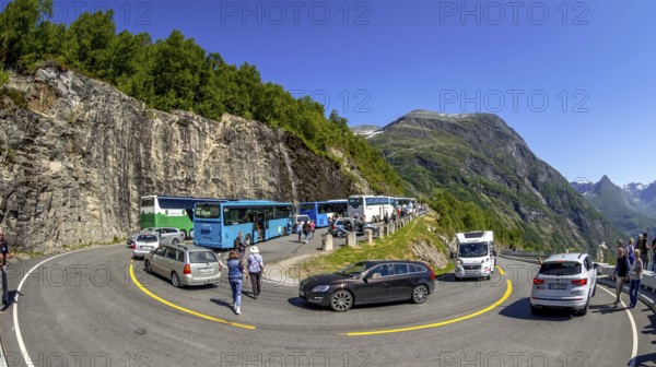 Gjerdefossen viewpoint, tourists, coaches, Geiranger, Møre og Romsdal, Norway, Scandinavia, Europe, adventure trip, European route E63, tourism, hairpin bends, Hurtigruten, Hurtigruten trip, cruise, Møre og Romsdal, NOR, travel, destination, sea trip, sightseeing, tourism, Norwegian, Scandinavian, touristic