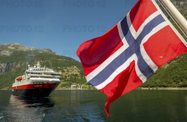 Ship MS Polarlys, Norwegian flag, Geiranger, Møre og Romsdal, Norway, Scandinavia, Europe, adventure trip, flags, tourism, Hurtigruten, Hurtigruten trip, cruise, cruise ship, Møre og Romsdal, NOR, national flag, trip, destination, ship, shipping, sea trip, sightseeing, tourism, Norwegian, Scandinavian, touristic