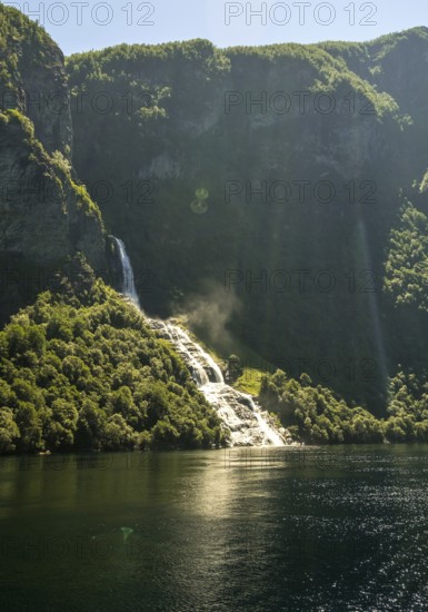 Seven Sisters Waterfall, Geirangerfjord, Geiranger, Møre og Romsdal, Norway, Scandinavia, Europe, adventure travel, mountains, mountainside, fjord, tourism, mountain, mountain range, mountain landscape, mountain range, Hurtigruten, Hurtigruten voyage, cruise, Møre og Romsdal, NOR, travel, destination, sea voyage, sightseeing, tourism, UNESCO World Heritage Site, forest area, waterfall, Norwegian, Scandinavian, tourist, waterfall