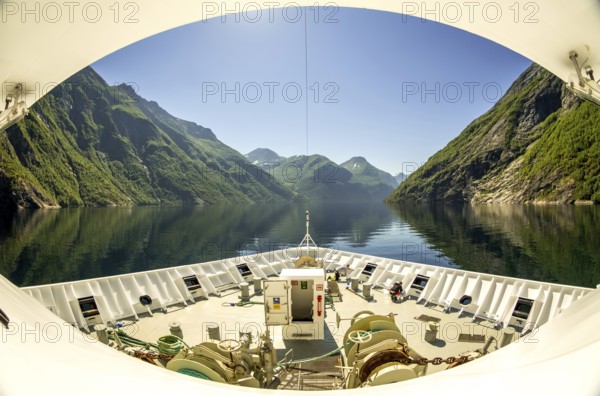 Panoramic view, bow, Eidsdal, Storfjord, Møre og Romsdal, Norway, Scandinavia, Europe, adventure trip, view, mountains, mountainside, fjord, tourism, mountains, mountain range, mountain landscape, mountain range, Hurtigruten, Hurtigruten voyage, cruise, Møre og Romsdal, NOR, panoramic view, panoramic photo, travel, destination, sea voyage, sightseeing, tourism, forest area, blue sea, Norwegian, Scandinavian, touristic