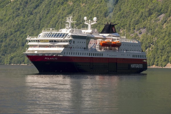 Ship MS Polarlys, Geirangerfjord, Geiranger, Møre og Romsdal, Norway, Scandinavia, Europe, adventure trip, fjord, tourism, Hurtigruten, Hurtigruten voyage, cruise, cruise ship, Møre og Romsdal, NOR, passenger ship, shipping company Hurtigruten AS, travel, destination, Royal Mail Ship, ship, shipping, sea voyage, sightseeing, tourism, UNESCO World Heritage Site, Norwegian, Scandinavian, tourism