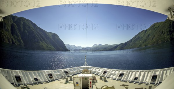 Panoramic view, bow, Storfjord, Stranda, Møre og Romsdal, Norway, Scandinavia, Europe, adventure trip, view, mountains, mountainside, fjord, tourism, mountains, mountain range, mountain landscape, mountain range, Hurtigruten, Hurtigruten voyage, cruise, Møre og Romsdal, NOR, panoramic view, panoramic photo, travel, destination, ship's bow, sea voyage, sightseeing, Stordal, tourism, blue sea, Norwegian, Scandinavian, touristic