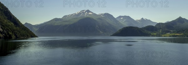 Panoramic view, fjord and mountain formations, Storfjord, Stranda, Møre og Romsdal, Norway, Scandinavia, Europe, adventure trip, mountains, fjord, tourism, Hurtigruten, Hurtigruten trip, cruise, Møre og Romsdal, NOR, nature, panoramic view, panoramic photo, travel, destination, ship bow, sea trip, sightseeing, tourism, blue sea, Norwegian, Scandinavian, touristic