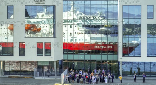 Cruise ship MS Polarlys, reflection, tourists at the quay, Ã...lesund, Møre og Romsdal, Norway, Scandinavia, Europe, adventure trip, excursion, excursion ship, tourism, harbour, Hurtigruten, Hurtigruten trip, cruise, cruise ship, Møre og Romsdal, NOR, journey, destination, ship, shipping, sea voyage, sightseeing, tourism, Norwegian, Scandinavian, touristic, Ålesund