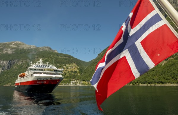 Ship MS Polarlys, Norwegian flag, Geiranger, Møre og Romsdal, Norway, Scandinavia, Europe, adventure trip, flags, tourism, Hurtigruten, Hurtigruten trip, cruise, cruise ship, Møre og Romsdal, NOR, national flag, trip, destination, ship, shipping, sea trip, sightseeing, tourism, Norwegian, Scandinavian, touristic