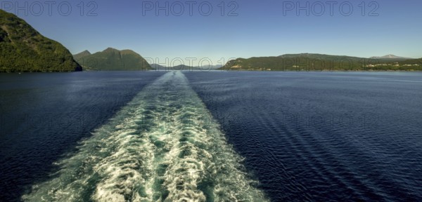 Foaming spray in the Storfjord, Ã˜rskog, Møre og Romsdal, Norway, Scandinavia, Europe, adventure trip, mountains, fjord, tourism, Hurtigruten, Hurtigruten voyage, cruise, Møre og Romsdal, NOR, travel, destination, sea voyage, sightseeing, tourism, blue sea, Norwegian, Scandinavian, tourist, Ørskog