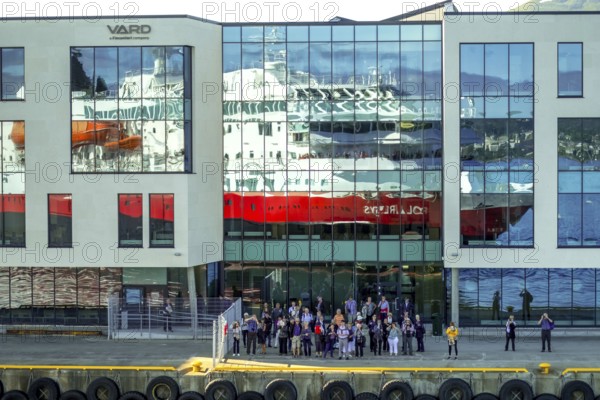 Cruise ship MS Polarlys, reflection, tourists at the quay, Ã...lesund, Møre og Romsdal, Norway, Scandinavia, Europe, adventure trip, excursion, excursion ship, tourism, harbour, Hurtigruten, Hurtigruten trip, cruise, cruise ship, Møre og Romsdal, NOR, journey, destination, ship, shipping, sea voyage, sightseeing, tourism, Norwegian, Scandinavian, touristic, Ålesund
