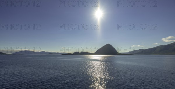 Backlight, island near Godøya, Møre og Romsdal, Norway, Scandinavia, Europe, adventure travel, mountain formation, tourism, Godøya, Hurtigruten, Hurtigruten voyage, cruise, Møre og Romsdal, NOR, travel, destination, sea voyage, sightseeing, tourism, blue sea, Norwegian, Scandinavian, tourist, northland voyage, northern sea, ship passage