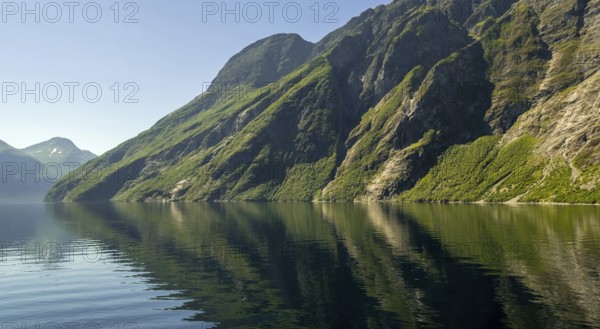Green mountainside, Storfjord, Eidsdal, Møre og Romsdal, Norway, Scandinavia, Europe, adventure trip, mountains, mountainside, fjord, tourism, mountain, mountain range, mountain landscape, mountain range, Hurtigruten, Hurtigruten trip, cruise, Møre og Romsdal, NOR, trip, destination, sea trip, sightseeing, tourism, forest area, blue sea, Norwegian, Scandinavian, touristic