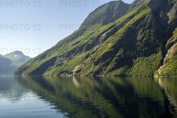 Green mountainside, Storfjord, Eidsdal, Møre og Romsdal, Norway, Scandinavia, Europe, adventure trip, mountains, mountainside, fjord, tourism, mountain, mountain range, mountain landscape, mountain range, Hurtigruten, Hurtigruten trip, cruise, Møre og Romsdal, NOR, trip, destination, sea trip, sightseeing, tourism, forest area, blue sea, Norwegian, Scandinavian, touristic