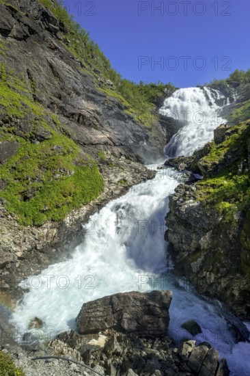 Kjosfossen waterfall, waterfall near Fureberget, rock faces, trees, sky, Flåm, Sogn og Fjordane, Norway, Scandinavia, Europe, Flåm, NOR, travel, tourism, destination, sightseeing, sea voyage, Hurtigruten, Hurtigruten trip, tourism, Norwegian, Scandinavian, tourist, cruise, adventure trip, waterfall, mountains, Flam Railway, Flamsbana, train journey, tour, travelling on the Flam Railway, Flam Railway