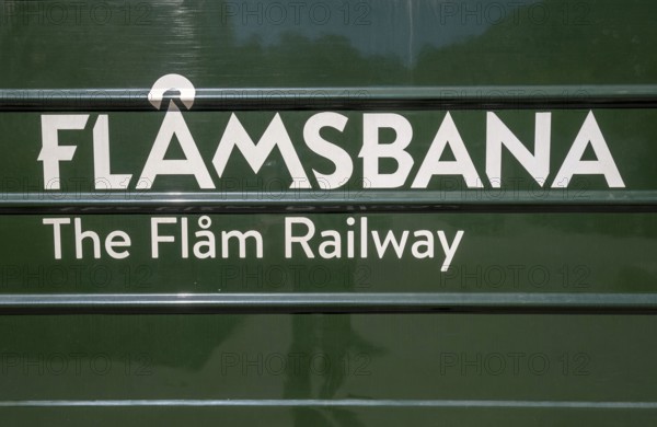 Journey on the Flam Railway, iron railway, green train with white lettering FlÃ¥msbana, The Flam Railway, Sogn og Fjordane, Norway, Scandinavia, Europe, Flåm, NOR, travel, tourism, destination, sightseeing, sea voyage, Hurtigruten, Hurtigruten trip, tourism, Norwegian, Scandinavian, tourist, cruise, adventure trip, railway, train, Aurlandsfjords, high mountains, tiles