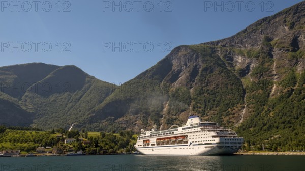 Excursion ship COLUMBUS, fjord, Nærøyfjorden, harbour, Stasjonsvegen, Varhaug, mountains, forests, wooden houses, blue sky, Flåm, Gudvangen, Sogn og Fjordane, Norway, Scandinavia, Europe, Flåm, NOR, travel, tourism, destination, sightseeing, sea voyage, Hurtigruten, Hurtigruten trip, tourism, Norwegian, Scandinavian, tourist, cruise, adventure trip, pier, hills, cliffs, station