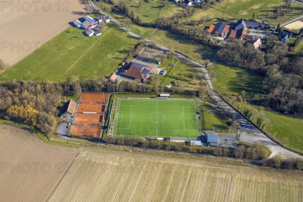Aerial view, sports facility football stadium and tennis courts Blau-Weiß Büderich, Kuniberthalle, Holtum, Werl, Soester Börde, North Rhine-Westphalia, Germany, DE, Europe, football pitch, football stadium, aerial view, aerial photography, aerial photography, sports, sports facilities, sports field, sports facility, stadium, tennis, tennis facility, tennis courts, overview, bird's-eye view, bird's-eye view, overview