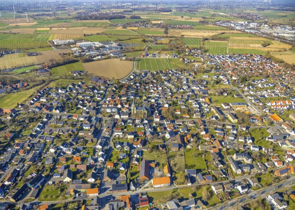 Aerial view, residential area local view with catholic church St. Kunibert, behind commercial area with furniture Turflon Werl, Westbüderich, Werl, Soester Börde, North Rhine-Westphalia, Germany, place of worship, DE, Europe, commercial enterprises, commercial space, commercial area, commercial property, commercial park, commercial site, commercial use, religious community, place of worship, property tax, holy site, real estate, industrial area, industrial site, church, church community, denomination, aerial view, aerial photography, aerial photography, religion, religious site, overview, bird's-eye view, residential area, residential area, residential quality, residential neighbourhood, residential estate, residential district, birds-eyes view, overview