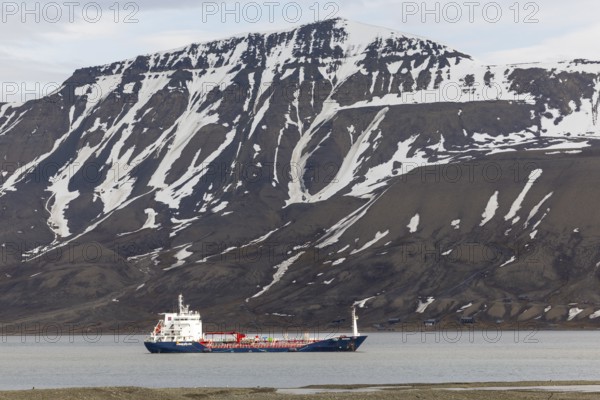 Cargo ship in the fjord off Longyearbyen, Spitsbergen, Svalbard